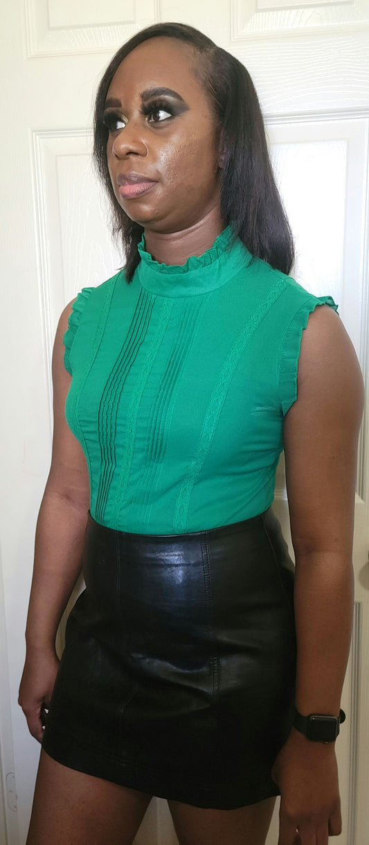 Emerald Green Sleeveless Top with Black Leather Skirt